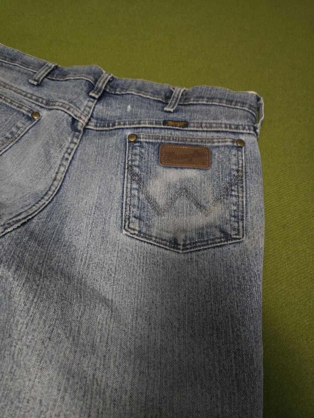 Distressed Wrangler Men's Washed Light Blue Denim Jeans